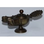 A Grand Tour-type patinated bronze oil lamp, after the Roman Antique, anthemion handle, double-