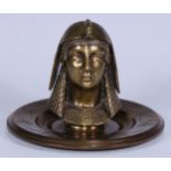 A 19th century Egyptian Revival gilt brass inkwell, cast as the head of a noblewoman wearing a