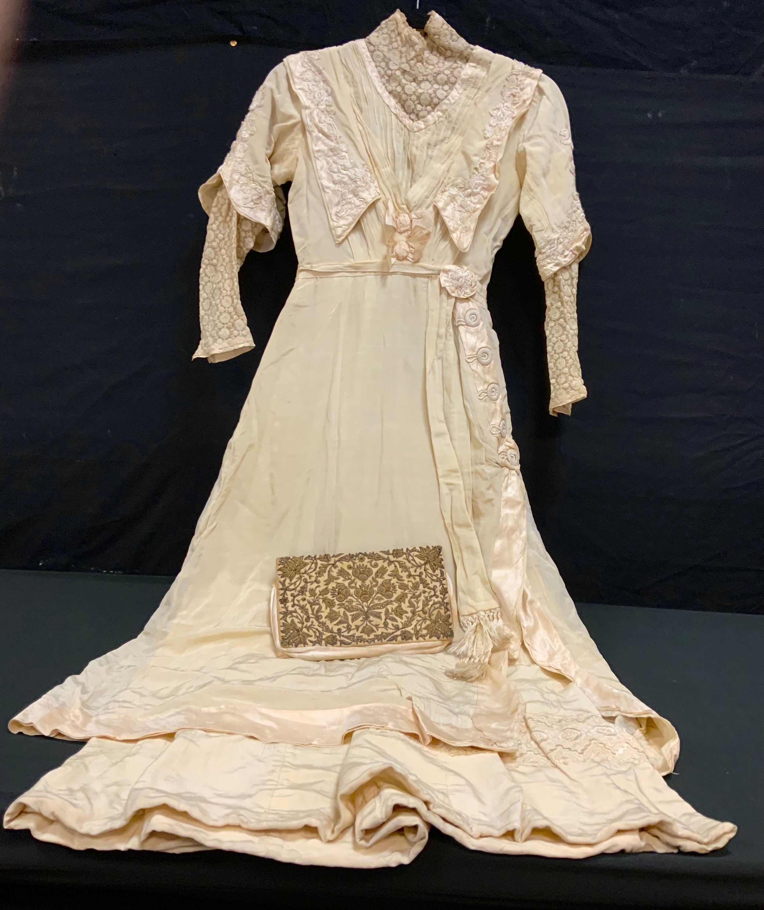 Fashion & Textiles - a Victorian hand made wedding gown, high collared lace neck, embroidered floral