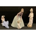 A Nao figure, 'Mother and Daughter', pattern No. 1318; a Nau figure by Lladro; another Nao