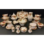 A Royal Albert Old Country Rose pattern table service inc two tier cake stand, teapot , six cups,