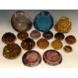 A Graduated Set of Five Early 20th century Pressed Amber Glass Posy Blocks, the largest measuring