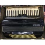 A Settimio Grand Piano Accordian, black case, 120 button, 41 keys, black travelling case, 52cm wide,