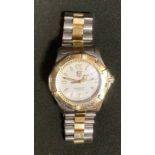 A Tag Heuer WK1120 professional 200 two tone steel cased wristwatch, serial no KY7972, cream dial,