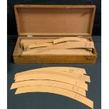 Tools - a vintage Architect's or Draughtsman's wooden curve drafting set, with assorted sizes and