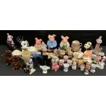 Wade Natwest piggy banks; Cadburys chocolate promotional cups; mid 20th century collectable egg