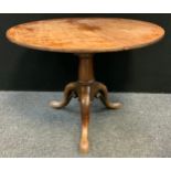 A Victorian mahogany tripod occasional table, circular top above a birdcage support, cylindrical