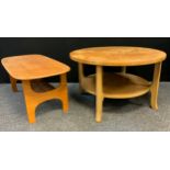 A retro mid 20th century teak circular two tier coffee table. wheel spoked top, shaped supports