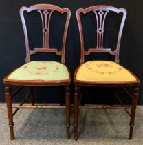 A Pair of Edwardian mahogany Bedroom chairs, pierced splat, turned legs and stretchers, padded