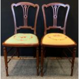 A Pair of Edwardian mahogany Bedroom chairs, pierced splat, turned legs and stretchers, padded