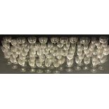 Late 19th and early 20th century glass; a set of approximately 30 'Key pattern' small wine or sherry