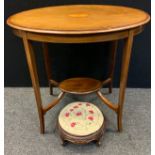 An Edwardian Oval, two tier occasional table; and a small victorian foot stool, (2).