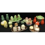 Early to mid 20th century decorative ceramics; a carlton ware condiment set, vibrant orange glaze;