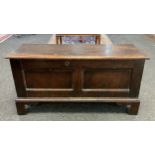 A late 18th/early 19th century two-panel oak blanket chest, 118cm wide x 61.5cm tall x 40cm deep.