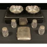 A pair of pierced serpentine bonbon dishes, Birmingham 1919, 36.1g, cased; a silver cigarette