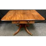 A 19th century mahogany Pembroke table, rounded rectangular top with fall leaves above two frieze