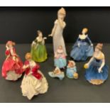 A Royal Doulton figure Fleur, Hn 2368; others Melanie Hn2271, Fragrance, Hn 2334, Top o The Hill, Hn