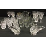Glassware - cut glass tumblers and wine glasses; lemonade jug; glass swans; etc