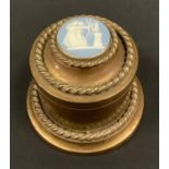 A 19th century jasperware mounted gilt metal cylindrical jewel box, the push-fitting cover applied