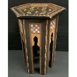 An Anglo Indian Moorish design inlaid hexagonal side table, geometric top inlaid with mother of