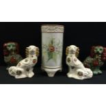 A pair of reproduction Staffordshire mantel dogs, unusual green glaze, 30cm tall; another pair of