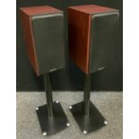 A pair of Monitor Audio Bronze 2 shelf speakers, with stands.