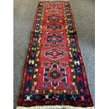 A Middle Eastern, Hamadan type Runner Carpet; hand-knotted with a geometric design predominantly