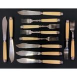 A set of six George V silver bladed fish knives and forks, 558g gross