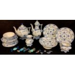 A Royal Copenhagen blue and white tete-a-tete, comprising two teacups, saucers and tea plates,