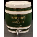 An advertising Sherry barrel, Garvey Jerez, with cover and tap