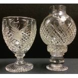 A crystal cut glass goblet engraved with a stag's head and the word Jager, 17cm; a similar