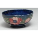 A Moorcroft Pansy pattern circular pedestal bowl, 7cm high, 16cm diam, impressed marks, signature