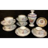 A set of six English porcelain tea and coffee cups with saucers, printed retailer's mark in puce for