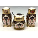 A Royal Crown Derby Imari 1128 pattern three piece cruet set, comprising salt, pepper and mustard