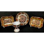 A pair of Royal Crown Derby 1128 pattern rounded rectangular trinket trays, solid gold band, 9cm,
