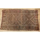 A Middle Eastern rectangular woollen rug, 137cm x 82cm