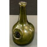 A rare George II mallet shaped seal wine bottle for 'Lord Blantyre' c.1730, kick up base, 17cm high.
