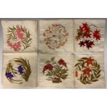 A Set of Three late 19th century embroidered silk panels.