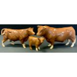 A Beswick Collectors Club Limousin Bull, Cow and Calf, produced for The Beswick Collectors Club