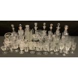 Glassware - heavy cut and pressed decanters; three pairs of pressed glass candle sticks; wine