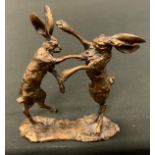 Paul Jenkins (British Bn. 1946), an animal bronze model, Fighting Hares, signed, 12.5cm high.