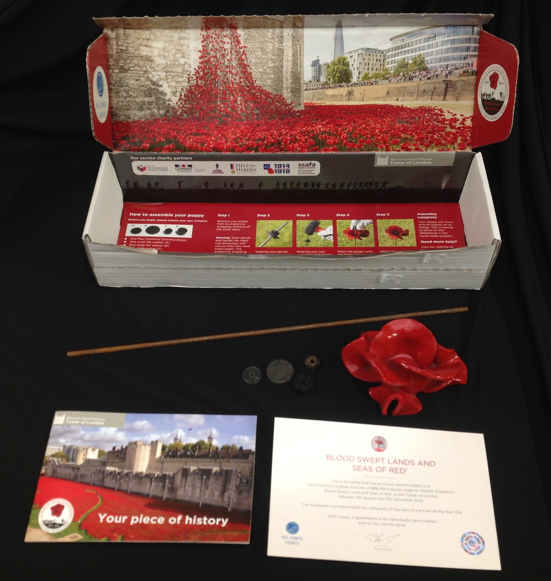 A Royal British Legion Centenary ceramic poppy by Paul Cummins made for the art installation at