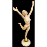 A Hutschenreuther figure, modelled by K Tutter, Sonnenkind, dancing female nude upon a golden orb,