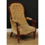 A Victorian mahogany library chair, deep-button back, stuffed-over upholstery, scroll hand rests,