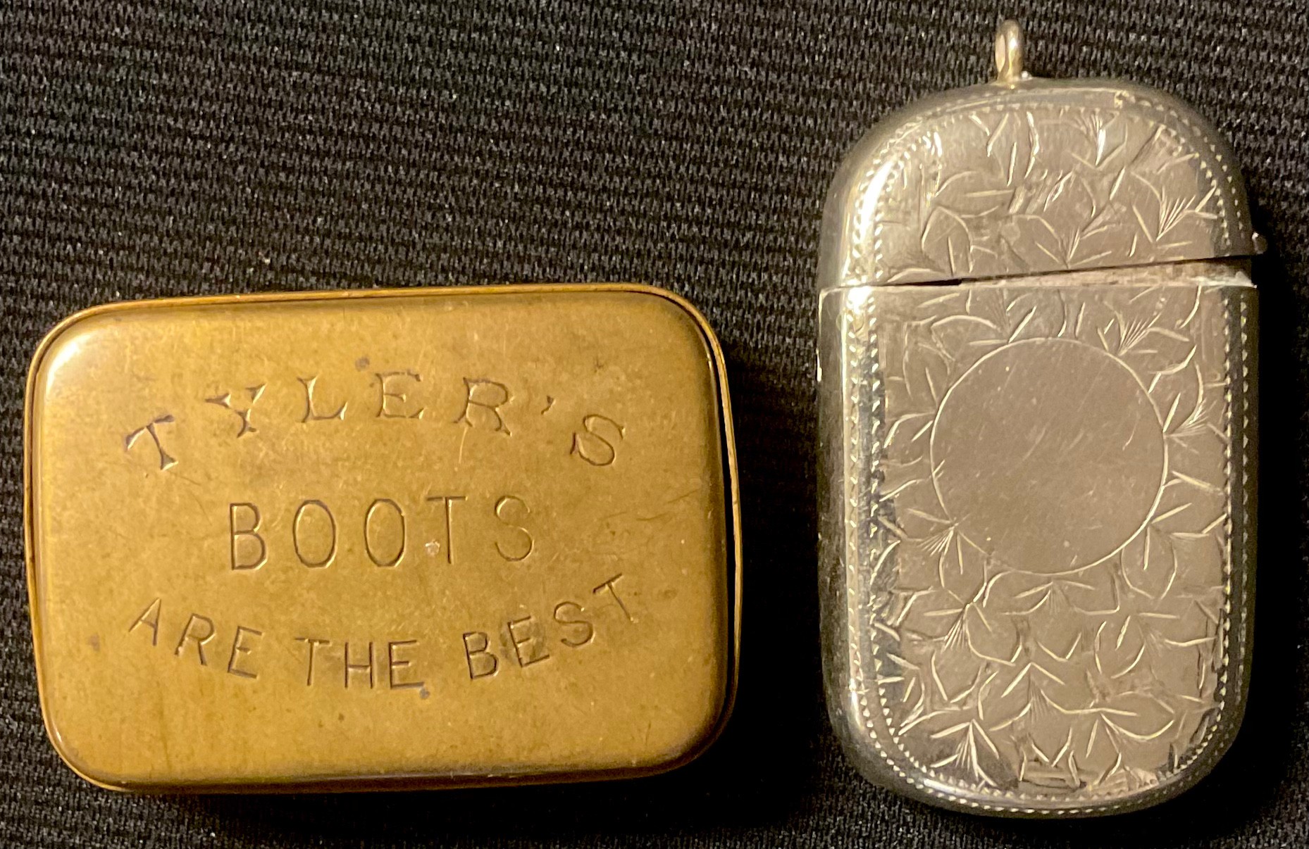 A Victorian advertising vesta, Tyler's Matchless Boots; a plated vesta (2)