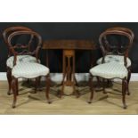 A set of four Victorian balloon back dining chairs, 83.5cm high, 45cm wide, the seat 33cm deep; an