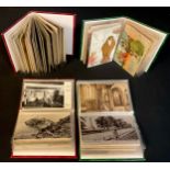 Postcards - Topographical cards and some Novelty cards in four small albums (144 cards in total)