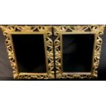 A pair of gilded carved wood mirrors, 79cm x 59cm