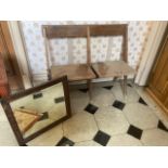 An early 20th century folding two seat school bench; a rectangular mirror **This lot is located at