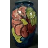 A Moorcroft Anemone vase, paper label to base, 9cm high